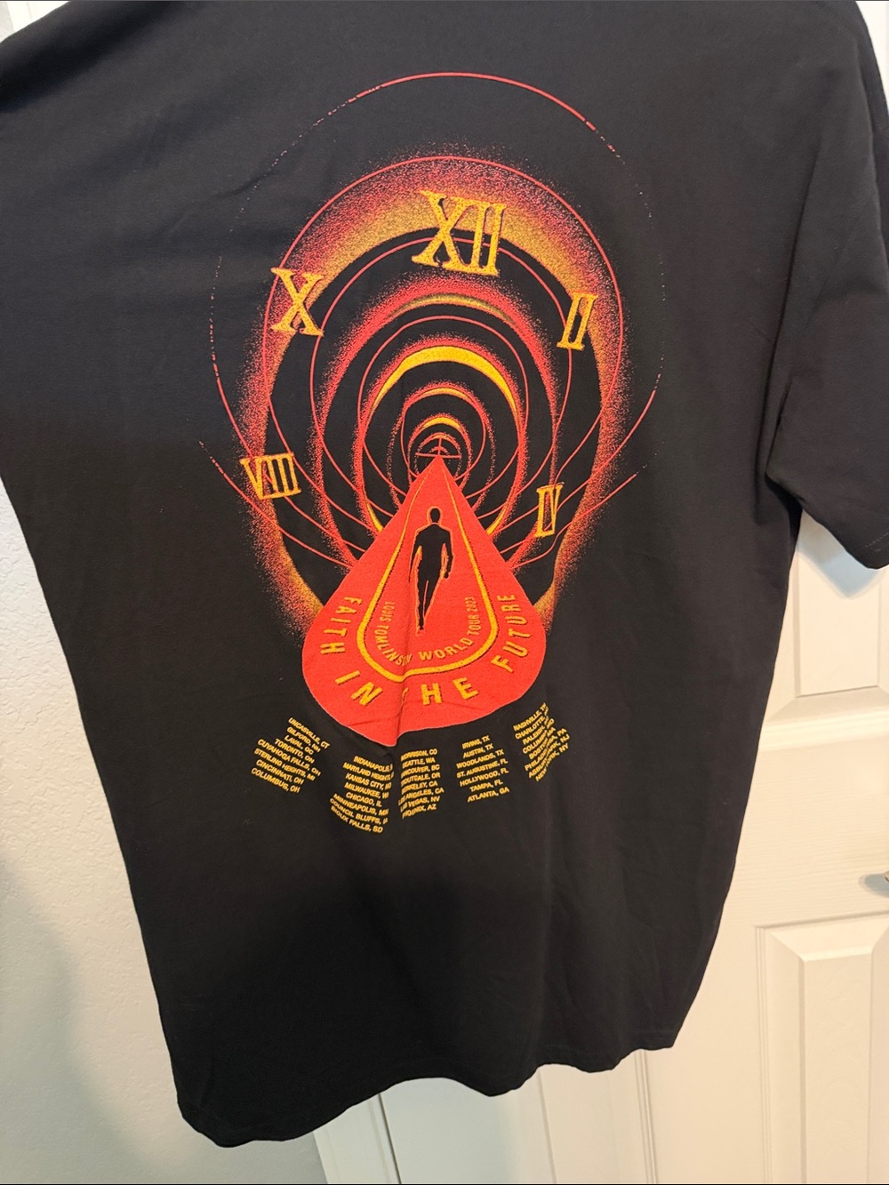 Black Short-Sleeve Graphic Tee with Red & Yellow Time Tunnel Print